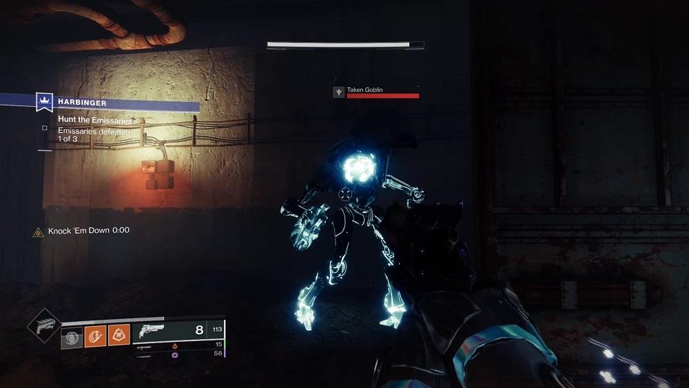 This second feather is easy to miss inside a rusty chain-link cage. Look for the red button, seen here, to open it.