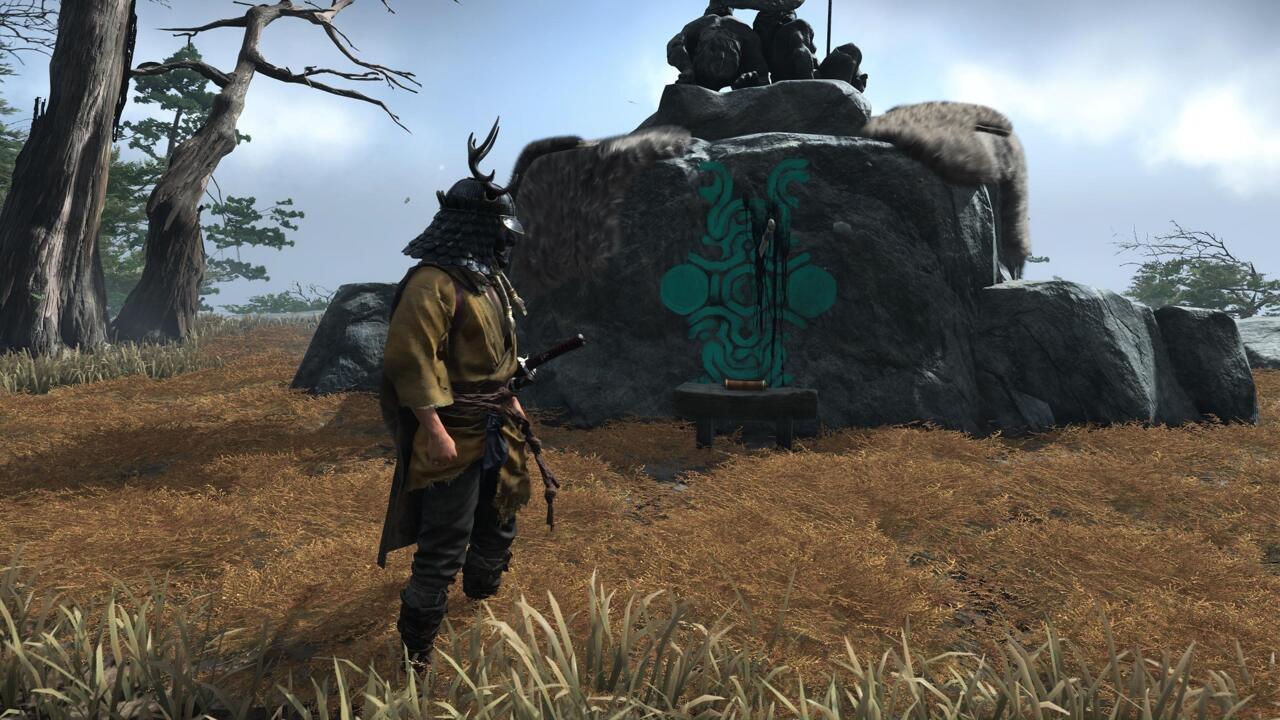 The shrine is marked with the symbol you'd find on a colossus, the sword protagonist Wander uses to slay them, and the inky darkness that bleeds from their wounds.