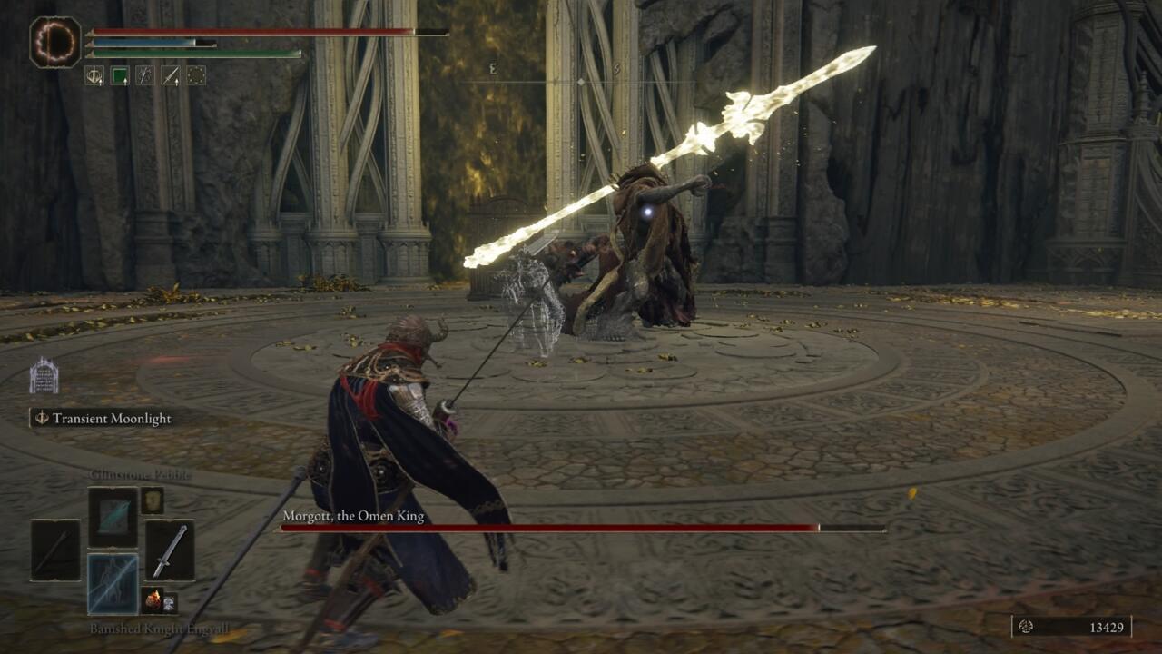 When he raises the spear above his head, be ready to roll as soon as he brings his foot back down.