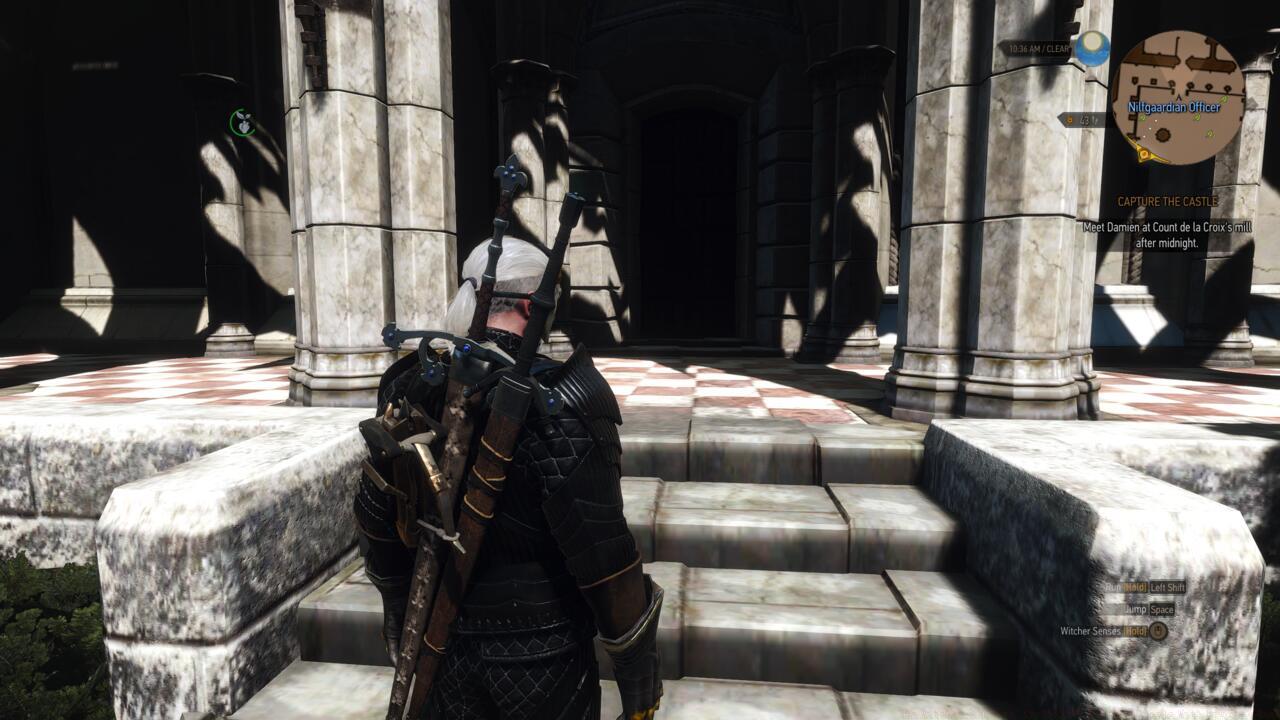 The door in the courtyard that you need to go through.