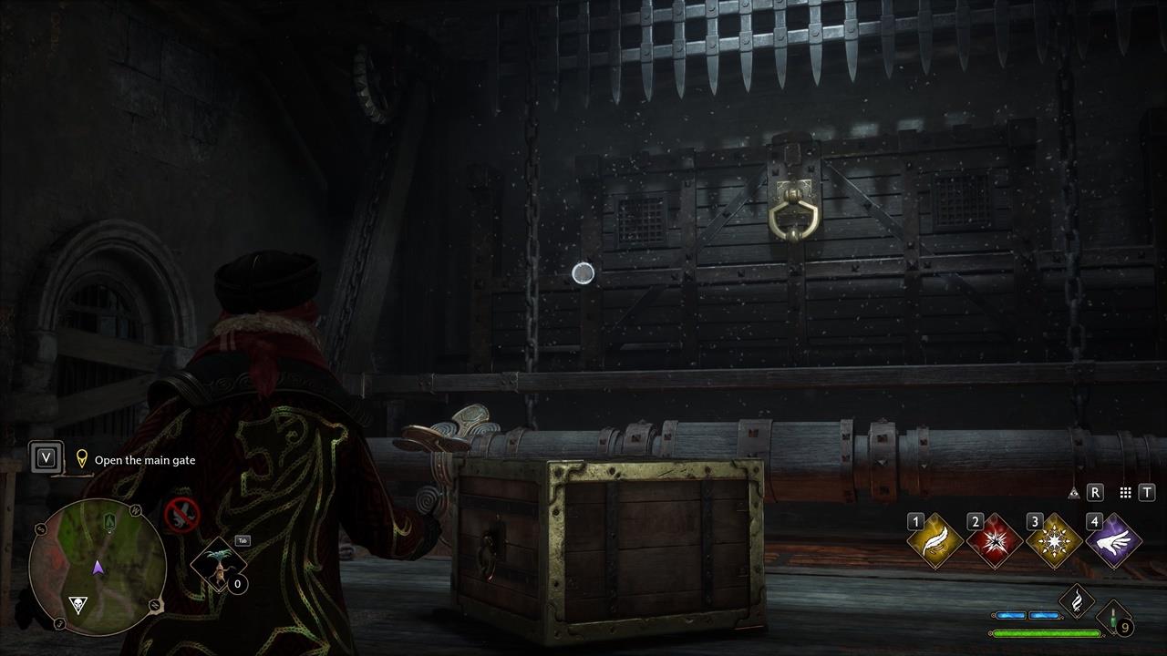 Use Depulso to make the device rotate, then pull the handle with Accio.