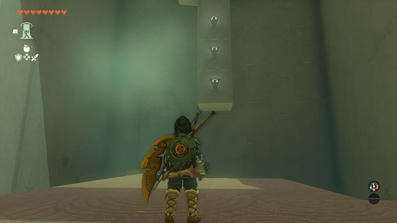 You need to ascend up the middle pillar.