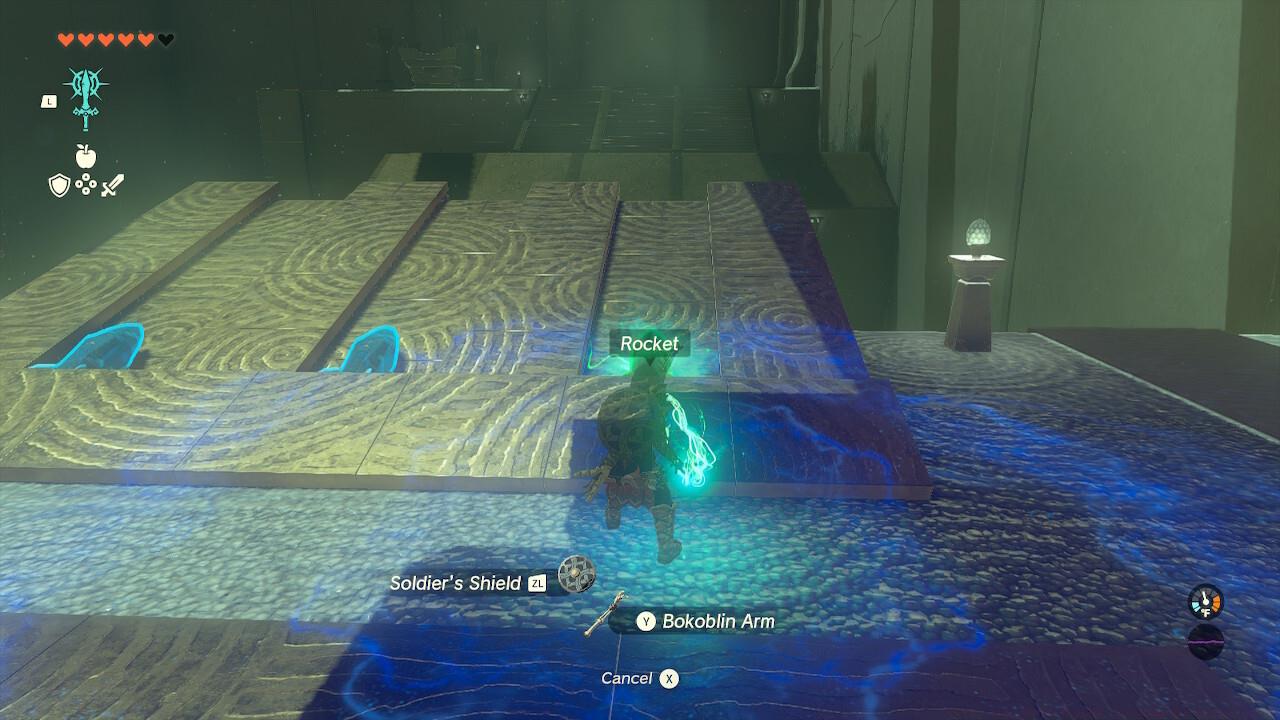 Fuse a rocket to your shield, then blast up to the chest on the small platform behind and above you.