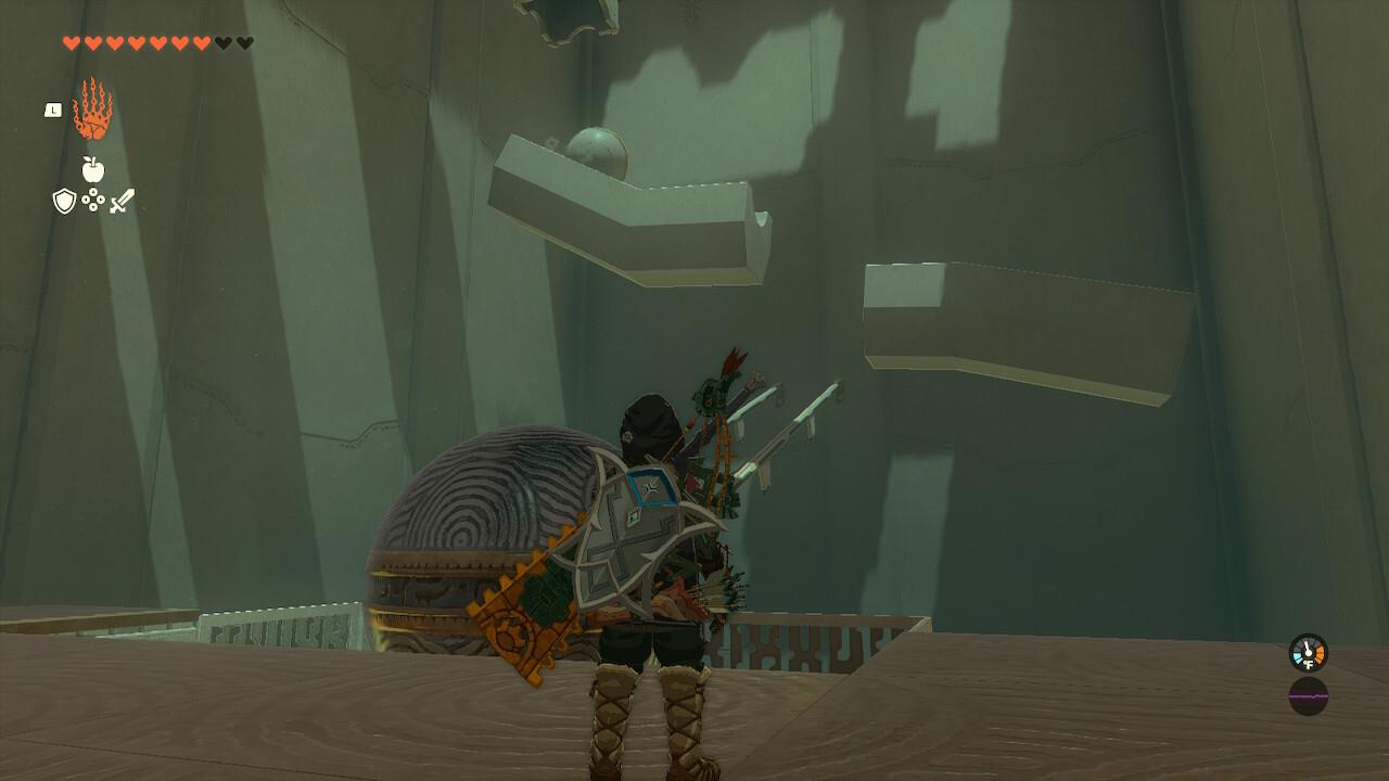 Use Ultrahand to make a path for the large metal ball towards the smaller ball. After, use Recall to make it float on its own.