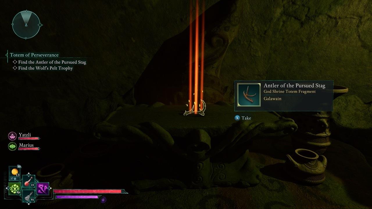 The Antler is past the vine-blocked door in the cave.