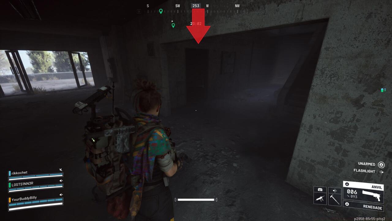 Enter this door left of the stairs.