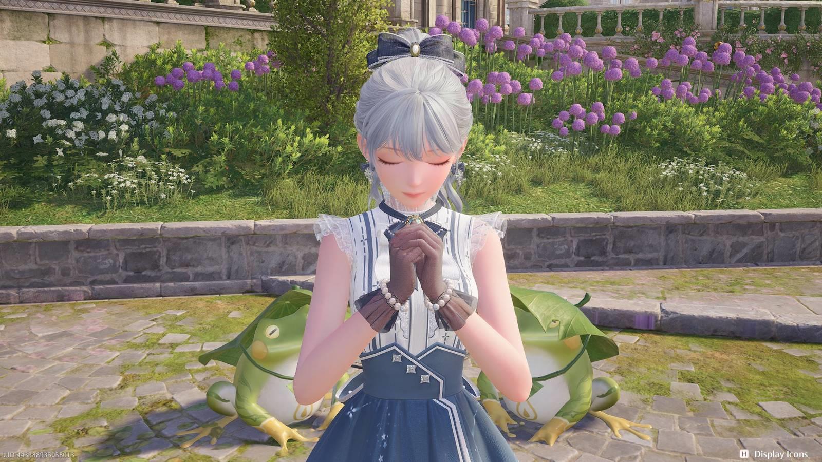 Nikki prays in front of some frogs in Infinity Nikki