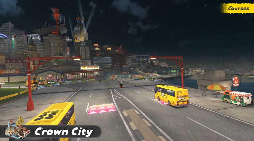 An image of Crown City in Mario Kart World. It’s set in an urban city with a towering skyline.