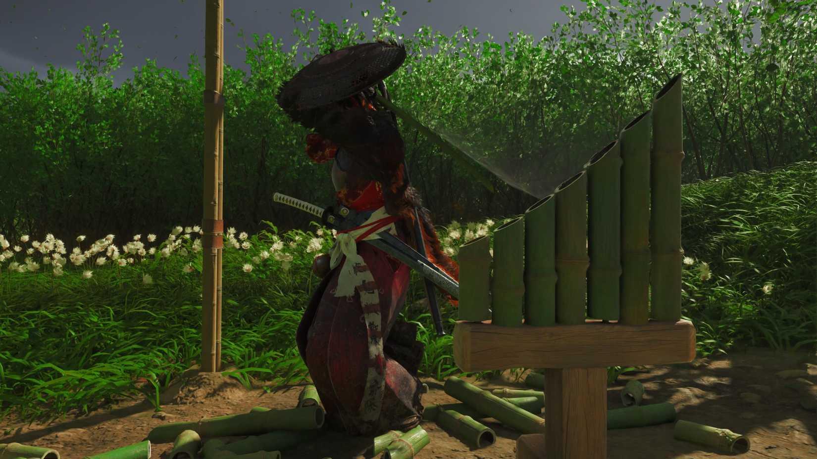 Atsu swings at a bamboo strike in Ghost of Yotei.