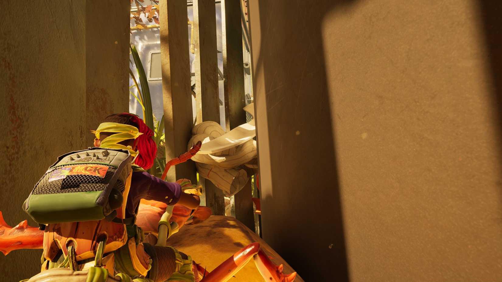 Willow looking at a plastic spoon in Grounded 2's trash can