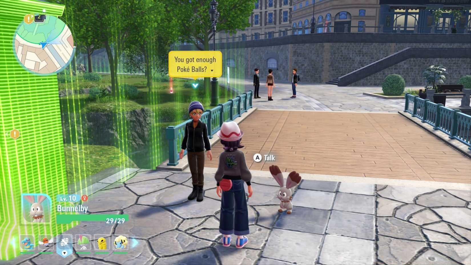 A Pokémon character stands in front of an NPC with yellow text above their head in Pokémon Legends: Z-A