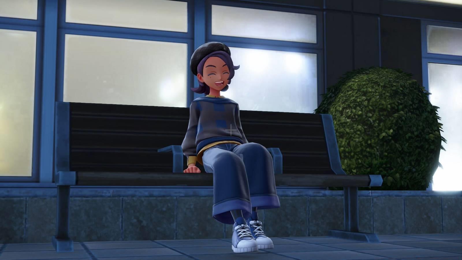 A Pokémon character happily sits on a bench in Pokémon Legends: Z-A.