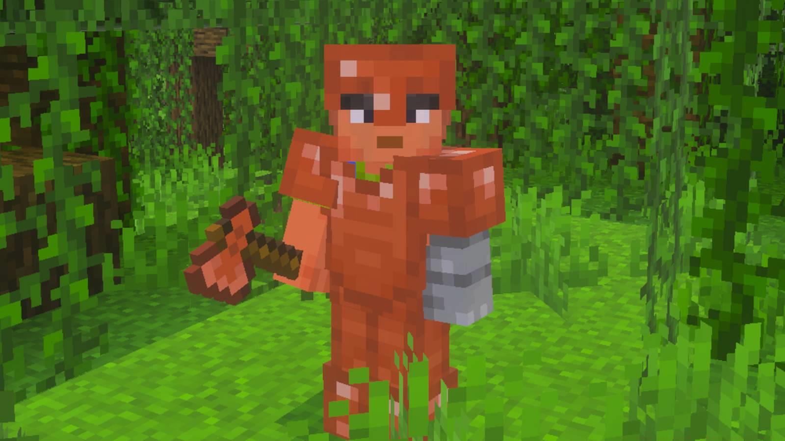A player wearing copper armor in Minecraft.