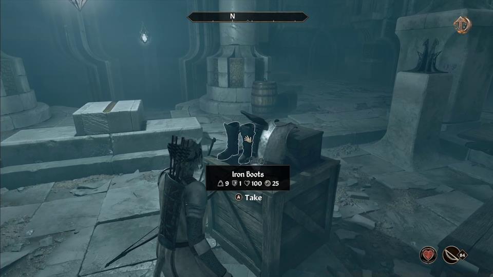 An image of iron boots sitting on a crate in Oblivion Remastered.